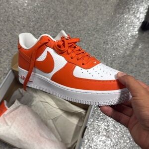 Orange and white AF1. Size 10. Never worn.